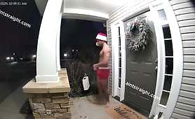 Drunk Man in Santa Hat Dances on Woman’s Porch